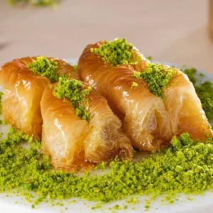 Turkish pistachio bird's nest baklava presentation with visible pistachio filling — Emmoğlu